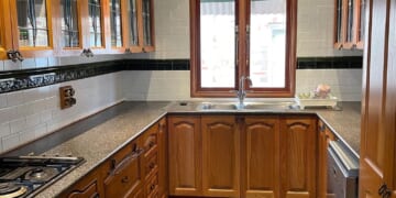 A Dated, "Very '80s" Kitchen Gets a Striking No-Demo Makeover